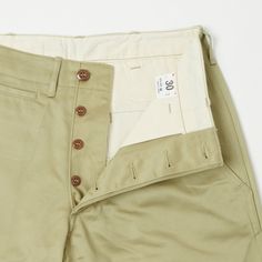 This 1960’s inspired chino from Denime of Japan has been specifically designed to be worn in a way ‘not bound by military specs’, and is cut from a crisp 100% cotton chino cloth which will break in beautifully over time. Military detailing includes small Urea buttons on the waistband and fly construction, and flat felled seams throughout. Boasting a straight leg, and a high rise, this trouser is incredibly easy, and comfortable to wear. The brand have used durable cotton for the pocket bags, and Luxury Cotton Chinos With Five Pockets, Family Dress, Flat Felled Seam, Cotton Chinos, Japan Style, Chino Pants, Pocket Bag, Japan Fashion, Clothing Co