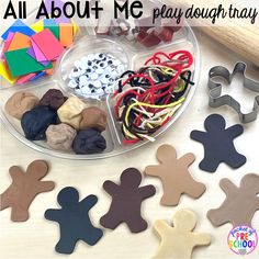 all about me play dough tray with cookie cutters and crafting supplies in it