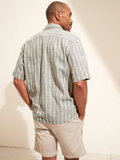 COTTON-VISCOSE LAWN: Our lightest shirt just in time for summer, this cotton-viscose shirt is made in a breezy fabric that’s super soft.  Camp collar.  Button front.  Straight hem.  Relaxed fit.  Short sleeves.  Hits at the hip.  Center back length Casual Beach Tops With Placket, Casual Short Sleeve Shirt With Placket For Vacation, Casual Vacation Tops With Placket, Unstructured Casual Camp Shirt For Vacation, Unstructured Spring Vacation Shirt, Spring Vacation Unstructured Shirt, Summer Top With Placket And Shirttail Hem, Unstructured Shirt For Beach In Spring, Unstructured Shirt For Beach And Spring