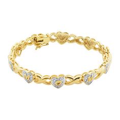 She's brightened your life numerous times; return the favor with this diamond-accent link bracelet that spells out "MOM" across the hearts.Metal: 18K two-tone gold over brassStone: Diamond accentClosure: BoxDimensions: 8mm wide; 7¼" longSome diamonds may consist of fewer than 17 facets.Jewelry photos are enlarged to show detail.