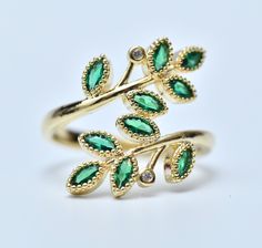 Dainty Emerald Ring Delicate Gold Ring, Green Diamond Gold Ring, Delicate Green Olive Leaf Ring, Statement Ring, Stackable Ring, Handmade ring. Quality 21 K goldfield ring, jewelry rings, green emerald jewelry, goldfield jewelry, leaf jewelry, twig jewelry, handmade jewelry Handmade ring with inlay, elegant green twig ring, ring for a woman, ring for a girl A gift for her A gift for a wife A gift for Valentine's Day A gift for a wedding anniversary A gift for a lover Emerald Leaf Ring, Green And Gold Jewelry, Green Diamond Ring, Twig Jewelry, Olive Leaf Ring, Green Diamond Rings, Delicate Gold Ring, Smaragd Ring, Green Emerald Ring