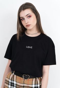 "L☹VE T-shirt. High-quality classic cut T-shirt designed by us and made in Poland. JOIN US ON INSTAGRAM 🌹 http://instagram.com/blvck.pl 🏷 PRODUCT DETAILS 🏷 Embroidery Crew neck 100% High-quality Cotton Made in Poland 📏 SIZING & FIT 📏 All our sweatshirts and T-shirts are unisex. Measurements (width/length) XS - 49/64 cm (19\"/25\") S - 51/68 cm (20\"/27\") M - 53/70 cm (21\"/27.5\") L - 55/72 cm (21.5\"/28\") XL - 57/74 cm (22.5\"/29\") 📦 SHIPPING AND DELIVERY 📦 We aim to process all o Grunge Short Sleeve T-shirt With Text Print, Simple Relaxed Fit T-shirt With Graphic Print, Trendy Short Sleeve Shirt With Letter Print, Basic Crew Neck Top With Front Print, Grunge Short Sleeve Top With Graphic Design, Short Sleeve Grunge Top With Graphic Design, Grunge Style Graphic Design Short Sleeve Tops, Trendy Slogan Tops For Everyday, Everyday Short Sleeve Tops With Screen Print