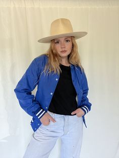 "the coolest blue and white letterman style bomber jacket! in great, almost like new condition; embroidered back that reads \"leominster\"; fully lined; dual hip pockets; tag reads a size small and fits true to size; for reference model is 5\"5\", 34B cup size, and typically a medium or size 6 so this jacket fits but is a tad small (if i wore it fully buttoned up) measurements: shoulder seam to shoulder seam- 17 1/2 inches, arm pit to arm pit- 19 1/2 inches, shoulder to bottom hem- 23.25 inches, Button Up, Like New, Bomber Jacket, Jackets & Coats, Blue And White, Adult Outfits, White, Blue, How To Wear