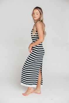 This dress is a summer must-have, whether you're looking forward to a cruise, a week of island-hopping in the Mediterranean, or a staycation at the neighbor's pool! The Eventide Maxi Dress is crafted from a comfortable cotton blend and features a slimming, strapless silhouette. Pair it with slides or tennis shoes for sightseeing, or with wedges for dinner at the resort! FIT: Runs true to size - fitted. MODEL: Model is 5’7” / wearing a small. MATERIAL: 48% Cotton, 40% Acrylic, 12% Nylon. GARMENT Strapless Maxi, Island Hopping, Strapless Maxi Dress, The Mediterranean, Looking Forward, Tennis Shoes, Ribbed Knit, Slides, Tennis