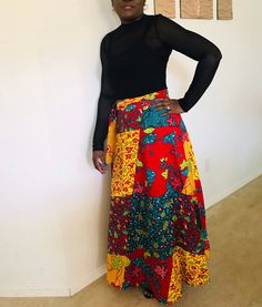 This elegant Ankara African Skirt is a wrap skirt and worn long!  Should fit small, medium and large sizes. Length of skirt is 40 inches! Multicolor Fitted Long Wrap Skirt, Fitted Tiered Maxi Skirt With Patchwork, Relaxed Wrap Maxi Skirt With Lining, Fitted Long Skirt With Patchwork, Fitted Multicolor Tiered Wrap Skirt, Fitted Patchwork Midi Skirt, Multicolor Relaxed Flared Wrap Skirt, Fitted Multicolor Lined Wrap Skirt, Fitted Multicolor Cotton Maxi Skirt