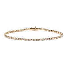 Turn heads with this stunning lab-grown diamond tennis bracelet. Set in warm 14-karat yellow gold  all the diamonds in this classic bracelet design are hand-matched for consistent color  clarity  and sparkle. A secure box clasp offers worry-free daily wear. Classic Gold Bracelet With Brilliant Cut, Classic Diamond White Gold Bracelet With Brilliant Cut, Classic Gold Diamond Bracelet With Round Cut, Classic Round Diamond White Gold Bracelet, Classic Gold Bracelet With Diamond White Prong Setting, Classic Gold Bracelet With Round Cut Cubic Zirconia, Classic Gold Bracelet With Brilliant Cut For Formal Occasions, Classic Gold Bracelet With Cubic Zirconia Round Cut, Classic Gold Bracelet With Prong Setting For Formal Occasions