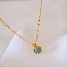 Elevate your style with our dainty jade necklace, featuring a striking green jade pendant on a chunky gold chain. This elegant piece seamlessly blends the natural beauty of green jade with the bold sophistication of a chunky gold chain, making it perfect for adding a touch of luxury to any outfit. Ideal as a gift for her, this natural green stone jewelry is versatile enough for both casual and formal occasions. Discover the timeless charm of this unique necklace, designed to enhance any look wit Gold Jade Round Pendant Necklace, Elegant Jade Necklace With Adjustable Chain, Gold Jade Necklace With Round Pendant, Gold Jade Pendant Necklace, Jade Clavicle Chain Necklace, Dainty Gold Jade Necklace, Green Charm Necklace With Round Pendant And Adjustable Chain, Green Necklaces With Gold Chain For Gifts, Green Charm Necklace With Adjustable Round Pendant