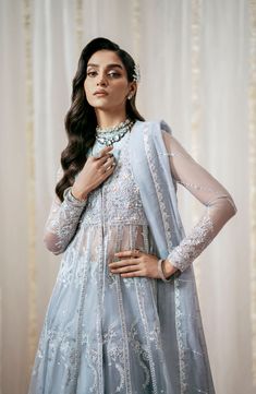 Pakistani Wedding Dress Royal Embroidered Pishwas Frock in Grey Shade is a magnificent Pakistani Wedding Dress with breathtaking embellishments on it. This dress comes with subtle decorations making this dress a very decent choice to style on any special event if you are looking for Pakistani Wedding Dresses. Embroidered Pishwas: This Pishwas Dress Pakistani comes with an elegant Pishwas in a subtle grey shade. The fabric of this maxi is premium quality chiffon. This dress is beautifully decorat Saree Wedding Dress With Intricate Embroidery, Eid Wedding Dress With Sheer Dupatta, Eid Ceremony Wedding Dress With Sheer Dupatta, Semi-stitched Anarkali Wedding Dress With Dabka Work, Anarkali Dress With Pearl Embroidery For Eid, Anarkali Wedding Dress With Dabka Work, Semi-stitched, Anarkali Wedding Dress With Dabka Work For Reception, Hand Embellished Floor-length Dress For Ceremony, Wedding Dress With Intricate Embroidery In Georgette