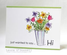 a handmade card with flowers in a vase on the front, and words just wanted to say hi