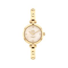 Timeless and elegant, the Cary watch is a sophisticated style perfect for day or night. The sleek yellow gold-tone design features a bangle bracelet detailed with the Coach Signature and a sand mother-of-pearl dial finished with the iconic Coach Horse and Carriage motif for a heritage touch. The watch has a 26mm case and is water resistant to 99 feet. Elegant Gold-tone Watch With Round Dial, Coach Watches Women, D1 Milano, Coach Watch, Horse And Carriage, Stainless Steel Bangles, Jewelry Lookbook, Handbags Online, Women's Watch