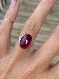 Genuine Pink Tourmaline measures 14mm x 10mm. The head of the ring measures 14mm at its widest point. The ring weighs 5.5g. The band tapers to 2.25mm at the back of the shank.  It is stamped 14k yellow gold. This ring is a size 5.25 and sizable. We are happy to provide sizing for an additional charge.  Let me know if you need a quote. Ruby Ring Cabochon, Pear Cabochon Ring, 14k Gold Oval Cabochon Gemstone Dome Ring, 14k Gold Dome Ring With Oval Cabochon Gemstone, Oval Cabochon Ruby Gemstones, 14k Gold Dome Ring With Oval Cabochon, Oval Ruby Cabochon Rings, Yellow Gold Tourmaline Cabochon Ring, Yellow Gold Ruby Ring With Oval Cabochon