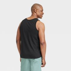 Bring cool comfort to warm-weather days with this Standard-Fit Tank Top from Goodfellow & Co™. Crafted from a lightweight jersey fabric, this standard-fit tank top offers you all-day cool comfort. Falling at the hip for wearing tucked in or untucked, you can coordinate this solid round-neck tee with different bottoms, or layer it under a button-down or hoodie for versatile styling. Goodfellow & Co™: Where style & fit are always in good company. Casual Relaxed Fit Tank Top With Go-dry Technology, Casual Go-dry Tank Top For Spring, Casual Spring Tank Top With Go-dry Technology, Casual Summer Gym Tank Top, Casual Cotton Activewear For Summer, Casual Relaxed Fit Tank Top For Sports, Black Relaxed Fit Activewear For Summer, Relaxed Fit Black Activewear For Summer, Casual Black Activewear For Vacation