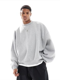 this is an oversized grey sweatshirt/jumper for men Gray Relaxed Fit Athleisure Sweater, Drop Shoulder Sweats With Ribbed Cuffs For Streetwear, Heather Grey Relaxed Fit Sweatshirt Athleisure, Gray Relaxed Fit Fleece Sweater, Solid Color Relaxed Fit Sweatshirt For Streetwear, Drop Shoulder Sweats For Streetwear In Fall, Oversized Gray Sweater In Athleisure Style, Gray Oversized Athleisure Sweater, Oversized Gray Athleisure Sweater