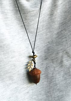 Handmade pendant  with natural acorn, which was picked right after it fall off of the oak tree. It was allowed to dry, cleaned and gently attached to the cap. Also, I added some playful beads to give it a special touch. The pendant has a black thread chain to carry on your neck. The thread is 40 cm length (if you want to get a longer thread, please let me know and I will add an extra length). This forest necklace will always keep a piece of my touch. It will gently adorn your neck and hold warm wishes inside. It could be worn as a talisman to keep you safe, attract success and love. The acorn necklace can be a real treasure for all nature lovers; It is really cute, pretty little thing and I hope you will enjoy this talisman as much as I have had to create it ♥ DIMENTIONS & SPECIFICS: ▶MATE Peter Pan Jewelry, Jewellery Creative, Oak Acorn, Acorn Jewelry, Celtic Pagan, Forest Necklace, Pagan Necklace, Acorn Pendant, Acorn Necklace