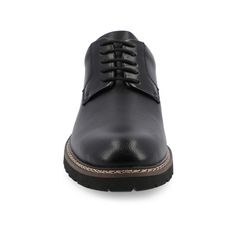 Introducing the Martin plain toe derby by Vance Co. These professional-style shoes are crafted with premium vegan leather, offering a sleek and business-savvy look. Featuring a 12 mm Tru Comfort Foam™ insole and a lace-up design, they provide all-day comfort and a secure fit. With a 1-1/4 inch block heel, round-toe shape, and padded tongue for extra comfort, the Martin derby combines professional style with maximum comfort, making it an ideal choice for the office or any occasion. Classic Synthetic Leather Shoes For Work, Classic Synthetic Leather Office Shoes, Modern Synthetic Dress Shoes For Business, Synthetic Round Toe Oxfords For Workwear, Synthetic Oxfords With Textured Sole For Work, Synthetic Oxfords For Workwear, Leather Derby Shoes For Workwear, Synthetic Lace-up Oxfords For Work, Lace-up Synthetic Oxfords For Work