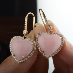 Genuine Heart Cut Pink Opal Gemstone Dangle Earrings Solid 18K Yellow Gold Opal Diamond Earrings Certified Jewelry Gift For Fiance ≫ Features * Items Code:- SGE01176 * Diamond: 100% Genuine Diamond * Diamond Wt.: 0.75 Ct. * Diamond Color: G-H * Diamond Clarity: S2-SI1 * Diamonds Cut: Brilliant Cut (Excellent Cut) * Pink Opal Wt.:- 10.33 Ct. * Metal: 18K Solid Gold (14K also available - Additional fees may apply) * More options in gold color: Rose gold, yellow gold, White gold * Earrings Size:- 3 Gold Plated Heart Pendant Earrings For Wedding, Pink Heart-shaped Gemstone Earrings, Pink Heart Gemstone Earrings, Heart Cut Gemstone Earrings For Wedding, Wedding Heart Cut Gemstone Earrings, Elegant Heart Gemstone Earrings For Valentine's Day, Valentine's Day Yellow Gold Gemstone Earrings, Gemstone Drop Earrings For Valentine's Day, Gold Gemstone Heart Earrings