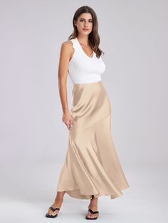 F00264892-403 Chic Solid Color Maxi Skirt With Lining, Chic Lined Maxi Skirt, Chic Lined Long Skirt, Chic Flowy Lined Skirt, Chic Tulle Maxi Skirt, Flattering Midi Skirt For Summer, Chic Lined Midi Skirt, Chic Stretch Lined Skirt, Chic Relaxed Lined Skirt