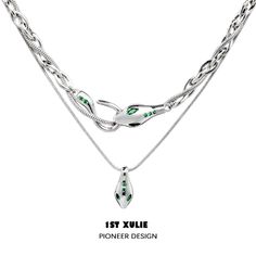 【High-Quality Materials】Woven from the finesse of brass, 18K platinum-plated to perfection, every inch of these necklaces radiates opulence. The premium green zirconia embellishments further elevate its grandeur, mimicking the mesmerizing gaze of a serpent. 【Size Details】 Necklace A boasts a length of approximately 22.05 inches, while Necklace B drapes gracefully at around 20.08 inches, allowing for a layered charm when worn together. 【Novel Design】 Envision two intertwined serpents, each tellin Luxury Green Chain Jewelry, Elegant Green Snake-shaped Jewelry, Silver Clavicle Chain Jewelry For May Birthstone, Luxury Cubic Zirconia Necklace For May Birthstone, Silver Emerald Pendant Necklace With Clavicle Chain, Green Cubic Zirconia Clavicle Chain Jewelry, Silver Emerald Pendant Necklace, Silver Necklace With May Birthstone Jewels, Green Cubic Zirconia Tarnish Resistant Jewelry