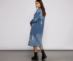 You in this trendy long-line denim jacket will be just a vibe! It features a collared neckline. long sleeves. a complete button-down front. top buttoned pockets. side pockets. and a mid-length. relaxed fit. Layer this jacket over a bodysuit and biker shorts and complete your look with combat boots.Fit & Features Collared neckline Long sleeves Complete button-down front Top buttoned pockets. side pockets Mid-length. relaxed fit Denim fabric. destructed details Runs true to size Denim Duster, Boots Fit, Lined Denim Jacket, Biker Shorts, Denim Fabric, Combat Boots, Coats For Women, Denim Jacket, Shirt Dress