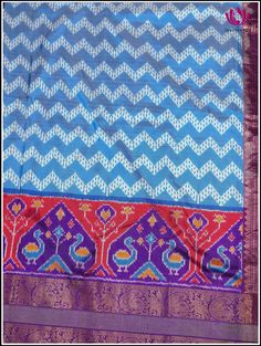 Step into this charming elegance of Kanchipuram Silk light blue saree, festooned with Ikkat pattern on its body. The blue foundation displays distinctive ikkat pattern, creating an unique and stunning look. Further it snuggled across the purple border featuring animal motif series that radiates zest for life. The vibrant purple pallu with animal motis in florals, woven in gold zari exudes perfect grandeur. The saree is accompanied by ikkat purple zari-bordered blouse, which adds opulence. Silk m Light Blue Saree, Ikkat Pattern, Blue Foundation, Purple Border, Blue Saree, Kanchipuram Silk Saree, Purple Silk, Vibrant Purple, Pure Silk Sarees