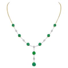 This remarkable necklace boasts 6.70 carats of Zambian emeralds displaying the crisp, verdant hue for which these gems are known for. Presented in platinum with 18K yellow gold, the vibrant Emeralds are complemented by lily-cut diamonds totaling 0.96 carats, exemplifying both artistry and craftsmanship. Soul Contract, Round Necklace, Zambian Emerald, Emerald Necklace, Gorgeous Jewelry, Zambia, Chains Necklace, Diamond Cuts, Platinum