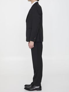 Two-piece suit in black wool. The jacket features classic lapels with brooch on lapel, single-breasted closure, two front welt pockets, a welt pocket on chest and buttoned cuffs. Straight-leg trousers with zip and button closure, two side welt pockets, two rear buttoned welt pockets and belt loops. Regular fit. The model is 184cm tall and wears size IT 50.Size nationality: IT Product number: 6734827 Product code: EQ7754SK62403999 Composition: 100% WOOL Suit With Jacket, Loafer Sneakers, Wool Suit, Straight Leg Trousers, Dress With Cardigan, Premium Brands, Clothes Collection, Cardigan Jacket, Limited Stock