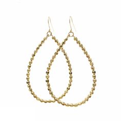 Gold fill 3mm faceted beads are strung onto teardrop shaped wire and dangle from ear-wire. Sterling silver option also available. Earrings are lightweight. Earrings from top of ear-wire measure 2.5 inches (63.5mm). Great everyday earrings! YOUR ORDER - Choose either gold fill or sterling silver in the drop-down menu. - You can select expedited shipping at checkout. Please note that shipping time does NOT include production time. - Item comes packaged in a jewelry box. Gold Faceted Teardrop Hoop Earrings, Gift Faceted Beads Dangle Teardrop Earrings, Gift Dangle Teardrop Earrings With Faceted Beads, Gold Teardrop Beaded Earrings, Gift Teardrop Dangle Earrings With Faceted Beads, Teardrop Earrings With Faceted Beads For Gifts, Everyday Teardrop Faceted Earrings, Faceted Metal Drop Earrings, Faceted Metal Earrings