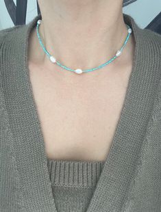 Hello :) I am so happy you stopped by! New designs are added weekly so check back often. All designs are handmade by this mommy.  Shop link ⬇️ https://enjewelrydesign.etsy.com This listing is for (1) turquoise & Pearl necklace.  DETAILS: * Sold as (1) Necklace** please check out the length before purchasing.  * Materials: Natural Turquoise Faceted Gemstone Beads with a  Fresh Water Pearls OR just turquoise beads.   Please note each pearl charm is unique and different in shape and size. And some pearls might have some imperfections.  * **Length: Approximately (end to end, including the clasp) Choose your length  - Please note fit and appearance will vary based on the individual. PLEASE READ BEFORE PURCHASING * NO RETURN/EXCHAGE  * Please contact me within 3 days of delivery if you have any Handmade Blue Turquoise Necklace For Summer, Handmade Turquoise Necklace For Summer Beach, Handmade Light Blue Necklaces For Summer, Handmade Light Blue Necklace For Summer, Everyday Blue Bohemian Beaded Necklace, Everyday Bohemian Blue Beaded Necklace, Handmade Turquoise Necklace For Summer, Handmade Adjustable Light Blue Necklace, Adjustable Handmade Light Blue Necklace