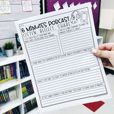 a person holding up a paper with the words 6 minutes on it in front of bookshelves