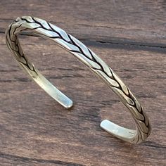 ❋ Handmade Sterling Silver Flexible Braided Cuff Bracelet, Natural look, for Man or Woman ❋Adjustable, Flexible, The Length end to end from the outside) about 6 7/8 inches ( / 17.5cm). ❋Size: M-L for women, S-M for men ❋ Metal Purity: 95% Silver. (Purer than 925 Sterling Silver). We also have Braided Silver Matching Earrings and Rings To browse some more of our silver jewelry collection you can click on the following links: https://www.etsy.com/shop/SilverShapes Earrings: https://www.etsy.com/sh Traditional Adjustable Engraved Braided Bracelet, Adjustable Artisan Sterling Silver Bangle Bracelet, Handmade Adjustable Sterling Silver Artisan Bracelet, Artisan Cuff Bracelets With Adjustable Fit, Traditional Adjustable Engraved Braided Bracelets, Adjustable Oxidized Finish Bracelets For Festival, Artisan Adjustable Cuff Bracelet, Adjustable Bohemian Sterling Silver Bangle Bracelet, Adjustable Bohemian Sterling Silver Bracelet