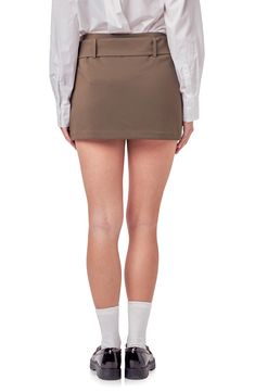 A belted waist brings polished style to a crisp skort featuring inner shorts for comfortable coverage as you go about your busy day. 95% polyester, 5% spandex Hand wash, dry flat Imported Belted Fitted Mini Shorts, Fitted Belted Mini Shorts, Fitted Belted Mini Length Shorts, Fitted Mini Length Belted Shorts, Fitted Mini Shorts With Belt Loops, Fitted Mini Length Shorts With Belt Loops, Belted Fitted Mini Skirt Skort, Fitted Belted Mini Skort, Fitted Mini Skort With Belt