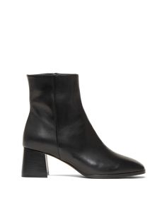 Crafted from smooth nappa leather, The Cristina bootie was designed with versatility in mind. Dress it up, dress it down, wear it with dresses, wear it with jeans. The classic silhouette—featuring an almond toe and walkable block heel—is essential to any cool-weather wardrobe. Block Heel Mid-calf Boots In Calf Leather For Work, Block Heel Calf Leather Mid-calf Boots For Work, Chic Stacked Heel Boots, Classic Stacked Heel Boots For Fall, Chic Medium Width Heeled Boots With Stacked Heel, Chic Boots With Stacked Heel For Work, Classic Formal Boots For Spring, Workwear Mid-calf Boots With Block Heel In Calf Leather, Workwear Mid-calf Boots With Block Heel