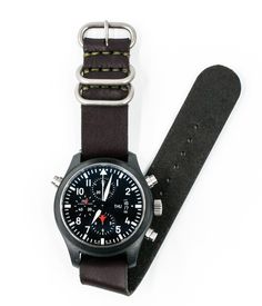 After years of creating leather watch straps for ourselves for use on a variety of watches, we are excited to release our version of the simple NATO leather strap. The NATO strap has an iconic history for a range of vintage military issued watches. We've tested this strap on a variety of watches, from Tudor and Timex to Luminox. It's a beautiful addition to new and vintage watches. Three widths available: 18mm, 20mm, and 22mm, sewn with durable dark green poly cording. All straps are precisely c Nato Strap Watches, Nato Strap, Adventure Gear, Nickel Hardware, Watch Straps, Leather Watch Strap, Vintage Military, Watch Strap, Vintage Watches