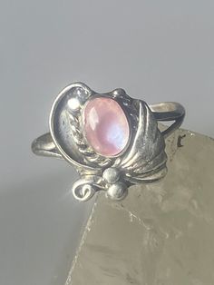 "Mother of Pearl ring southwest pinky floral leaves blossom baby children women girls z Size 2 Weight 1.2g Length 3/8\" Width 3/8\" Thinnest part of band 3/32\" Free Shipping & Free Postal Insurance Delivered in a Gift Box If you do not want the ring polished and want to leave the natural patina please let me know at the time of purchase as I do polish rings before I ship rings out. Thanks Free First Class shipping and postal insurance is included. If you want to upgrade to priority kindly pay a Mother Of Pearl Ring, Floral Leaves, Pearl Ring, Rings Statement, Mother Of Pearl, Statement Rings, Women Girl, Gemstone Rings, Jewelry Rings