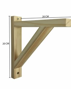 a wooden shelf with measurements for the top and bottom