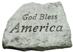 a stone with the words god bless america written on it