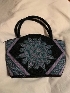 This beautiful handbag is a show stopper. With  a unique design and artfully crafted bead work. Unique Handmade Evening Bags, Handmade Bohemian Evening Bag For Everyday Use, Handmade Bohemian Shoulder Bag For Evening, Bohemian Evening Bag For Everyday Use, Evening Bohemian Handmade Shoulder Bag, Artistic Rectangular Evening Bag, Artisan Beaded Bags As Gifts, Bohemian Handwoven Evening Bags, Bohemian Handmade Evening Bag