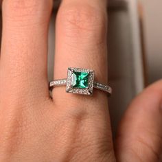 Emerald ring princess cut emerald emerald engagement ring | Etsy Princess Cut Diamond Emerald Ring For Promise, Princess Cut Emerald And Diamond Promise Ring, Elegant Emerald Ring With Halo In Cubic Zirconia, Elegant Emerald Cubic Zirconia Ring With Halo, Elegant Emerald Halo Ring With Cubic Zirconia, Silver Princess Cut Emerald Ring For Wedding, Emerald Diamond Halo Promise Ring, Elegant Green Halo Ring With Cubic Zirconia, Emerald Diamond Ring With Halo For Promise