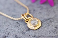 "Gold and a raw diamond pendant necklace in 14k, 18k, 22k yellow and 14k white, and rose gold.  This Gold Boho Necklace is stunning and unique. It has a raw and round diamond set in a solid gold pendant. The pendant has a rough and distinct handmade look. This impressive pendant has a \"handle\" connected to the necklace with two gold loops.  This beautiful necklace is eye-catching but very dainty and will complement any outfit. The necklace's antique-style and rustic design combined with the ra Yellow Gold Sterling Silver Necklace With Rose Cut Diamonds, Delicate Gold Jewelry With Rose Cut Diamonds, Gold Sterling Silver Necklace With Rose Cut Diamonds, Gold Pendant Diamond Necklace With Bezel Setting, Gold Diamond Pendant Necklace With Bezel Setting, Gold Diamond Necklace Stamped 14k For Gift, Gold Diamond Pendant Necklace With Gemstone, Gold Sterling Silver Diamond Necklace With Gemstone, Gold Diamond Necklace With Gemstones In Sterling Silver