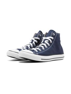 "Find CONVERSE Chuck Taylor All Star Hi \"navy\" Sneakers on Editorialist. Navy blue canvas All Star Hi top sneakers from Converse featuring a round toe, a lace-up front fastening, a flat rubber sole and side logo patch. These styles are supplied by a premium sneaker marketplace. Stocking only the most sought-after footwear, they source and curate some of the most hard to find sneakers from around the world." Blue Lace-up High-top Sneakers With Elastic Laces, Blue High-top Sneakers With Elastic Laces For Streetwear, Sporty Navy Cotton Sneakers, Sporty Canvas Sneakers With Lace-up Fastening, Navy High-top Sneakers With Laces, Blue Lace-up High-top Sneakers With Vulcanized Sole, Blue Casual Cotton High-top Sneakers, Blue Converse Canvas Sneakers, Blue Cotton Sneakers With Laces