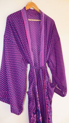 "Silk Polyester kimono robes are perfect for lounging around the home or spa. Use our silk robe as a cover up on the beach or after a dip in the pool. Add a luxe, boho feel to your bridal shower. Versatile, soft and luxurious, our silk kimono robes are printed with azo-free dyes. The silk Polyester robe features Full sleeves, a waist tie and two front pocket. Length - 50 inches (125Centimeter), Measurements Approx : *Length: 50\" Inches *Bust Around Size: 50\" Inches *Shoulder: 8\" Inches *Sleev Beachwear Cover-up Wrap For Loungewear, Beachwear Wrap Cover-up, Long Sleeve Robe For Beach Cover-up, Silk Wrap Kimono For Loungewear, Long Sleeve Beach Cover-up Robe For Beach Season, Silk Wrap Kimono For Vacation, Silk Summer Robe With Kimono Sleeves, Silk Robe With Kimono Sleeves For Summer, Summer Silk Kimono With Tie Waist