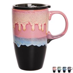 a pink and black coffee mug with drips on the bottom, three different colors