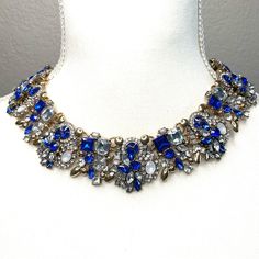 Royal Blue Rhinestone Statement Necklace That Is Thicker And More Of A Collard Necklace Rather Than A Low Hanging Necklace. Extra Fancy And Eye Catching. Nwt Blue Jeweled Necklaces For Party, Blue Jewel Necklaces For Parties, Blue Jeweled Party Necklaces, Elegant Blue Rhinestone Necklace With Sparkling Stones, Blue Crystal Necklace In Costume Jewelry Style, Blue Crystal Necklace Costume Jewelry, Elegant Blue Crystal Rhinestone Necklace, Blue Crystal Costume Jewelry Necklace, Sapphire Rhinestone Party Necklace