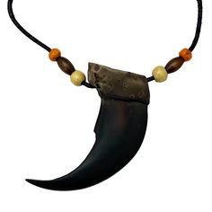 This quality resin replica bear claw pendant necklace is ideal for a native or wildlife themed accent, and a western or Indian accessory. Cast from the real thing, hand finished and hand painted. Includes chain. Sizes: 3" claw, 1.5" claw Handmade Black Claw Jewelry, Unique Hand Tooled Black Jewelry, Thing Hand, Bear Claw Necklace, Indian Accessories, Claw Necklace, Bear Claw, Bear Claws, Forest Hill