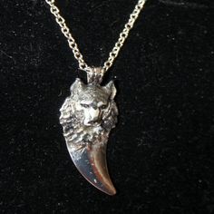 This Necklace Is Made From A Pewter Blank And Hand Enameled By Me. The 3-D Wolf Head Portrait Has The Natural Silver Gray Coloring Of A Timber Wolf And Is Placed At The Top Of A Silver Toned Claw/Tooth. It Is Subtle And Has The Quiet Power Of The Wolf. The Pendant Is 2" Long By 5/8" Wide. It Hangs From A Silver Toned, Nickel Free Cable Chain That Is 18" Long And Extendable To 20" With A Lobster Claw Clasp. This Necklace Would Look Great With Southwestern Attire Or Other Clothing Where You Wish T Moon Cradle, Head Portrait, Timber Wolf, Wolf Head, The Wolf, The Quiet, Bling Bling, Cable Chain, Lobster Claw