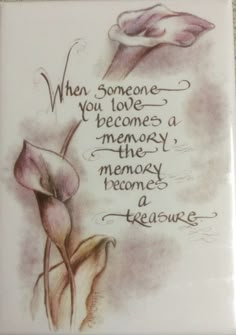 a ceramic plaque with an image of two flowers and the words, when someone you love becomes