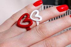 Item Style: Red and White Heart Ring Material: Acrylic Size: Adjustable Trendy Heart-shaped Rings For Valentine's Day, Valentine's Day Red Heart Ring, Trendy Heart Ring For Valentine's Day, Trendy Heart Ring For Valentine's Day Anniversary, Red Adjustable Heart Ring For Valentine's Day, Adjustable Red Heart Ring For Valentine's Day, White Rings For Valentine's Day, White Heart-shaped Rings For Valentine's Day, Cute Red Ring For Gift