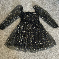 Never Worn, Tulle Black, Gold, Stars Dress! Super Cute And Lined Dress. Wdirara Girl's Polka Dots Mesh Puff Long Sleeve Ruffle Hem A Line Dress Star Print Dress For Party Season, Party Mini Dress With Star Print, Black Mini Length Christmas Dress, Long Sleeve Star Print Dress For Night Out, Black Mini Dress For Christmas, Fitted Black Dress By Amazon, Black Fitted Dress By Amazon, Fitted Black Amazon Dress, Amazon Black Fitted Dress