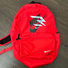 Brand New With Tag Never Been Used Nothing Wrong With It Price Includes Shipping And Taxes We Paid For When Purchased Functional Red Backpack, Functional Red Standard Backpack, Red Functional Standard Backpack, Red Nike Travel Bag, Nike Red Travel Bag, Red Backpack For School, Red Standard Backpack With Zipper Closure, Casual Red Standard Backpack, Nike Rectangular Backpack For Everyday Use