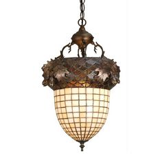 a light fixture hanging from the ceiling with an intricate design on it's side